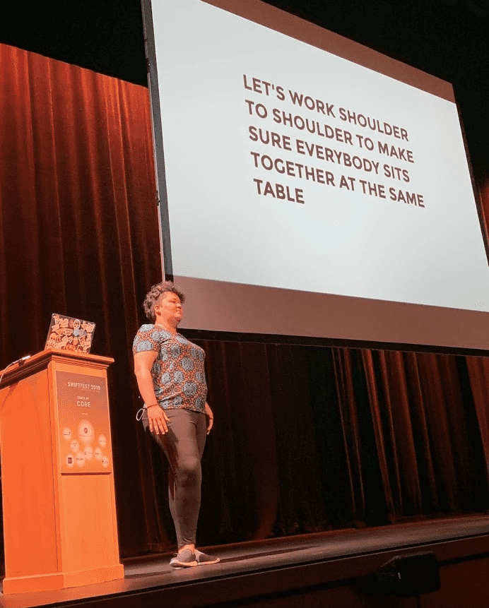 Diana Rodriguez presenting at podium